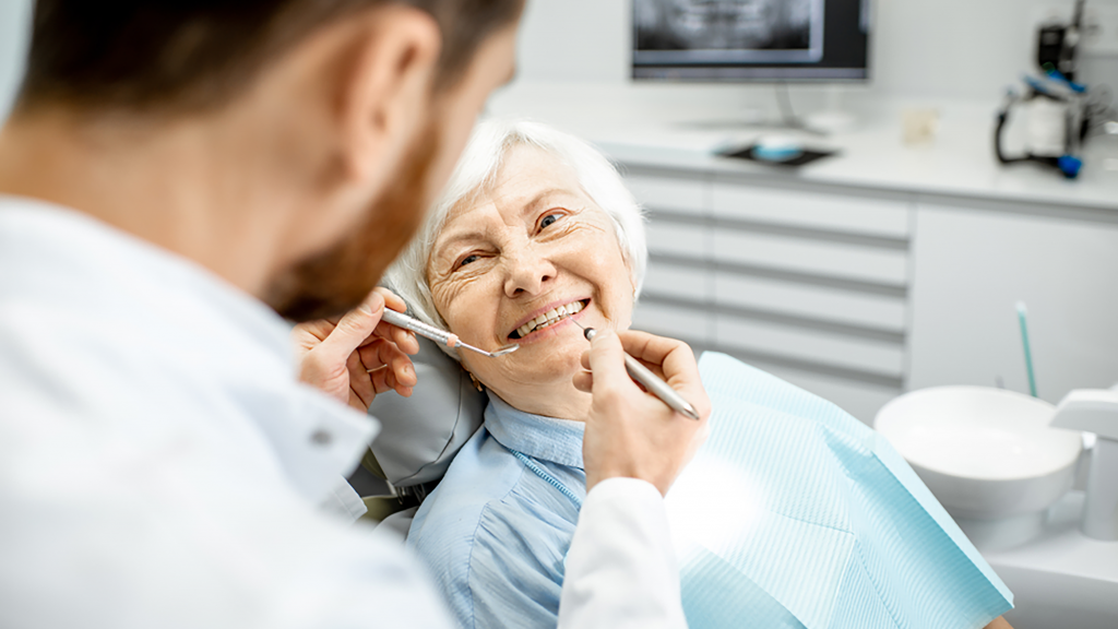 Elderly woman in dental chair